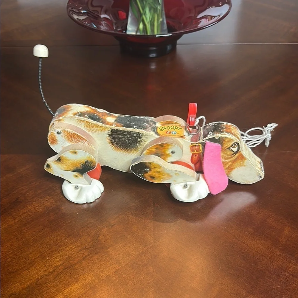 Fisher-Price Snoopy Dog Pull Toy with Red and Black Accents